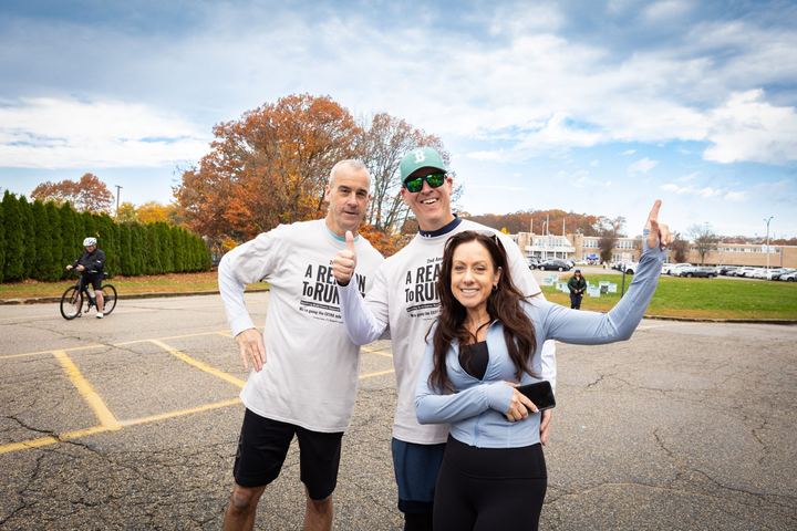Three participants posing together